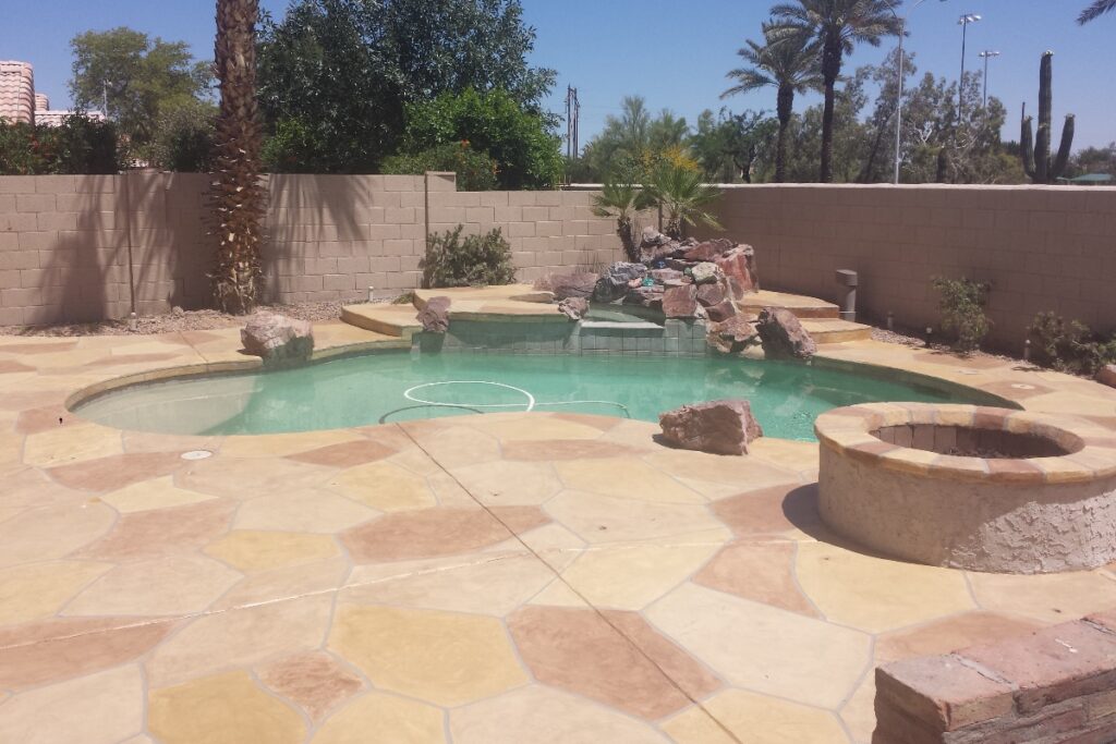 Concrete pool deck overlay beside a swimming pool